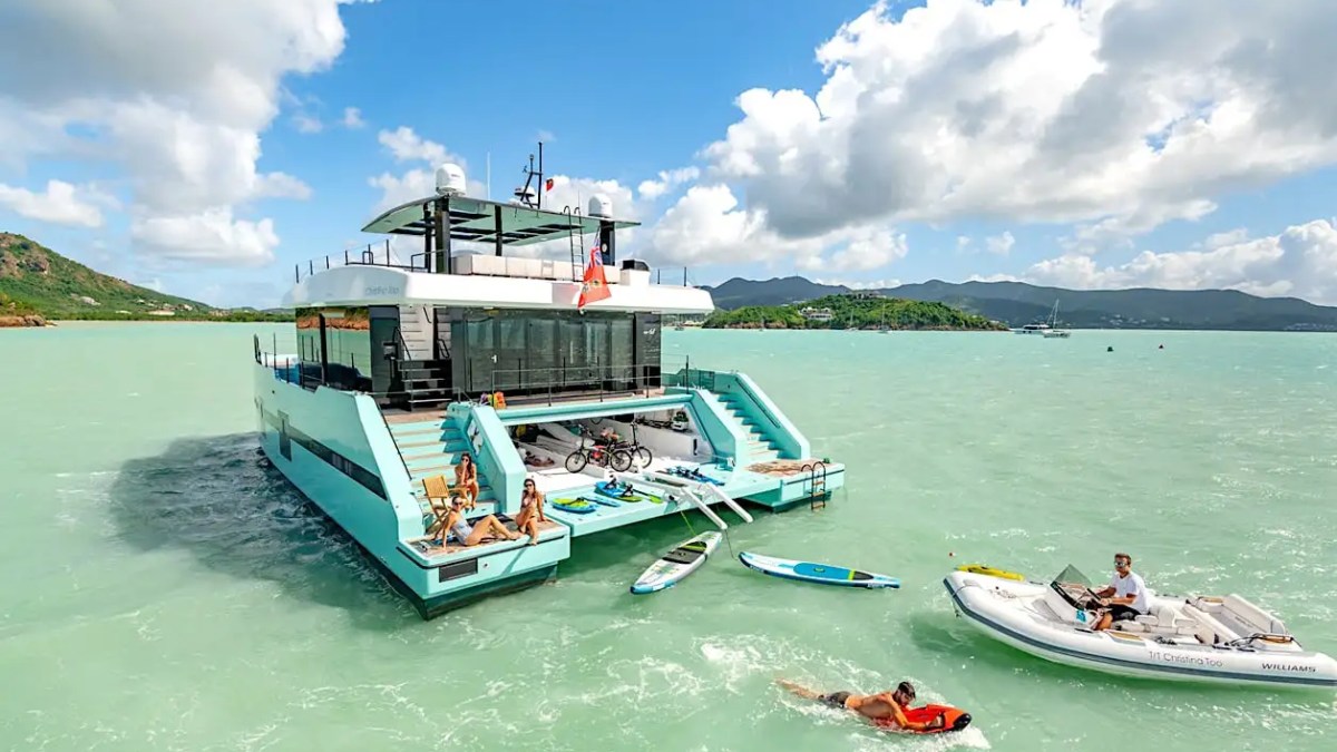 70' Sunreef power catamaran yacht charter water toys swim platform