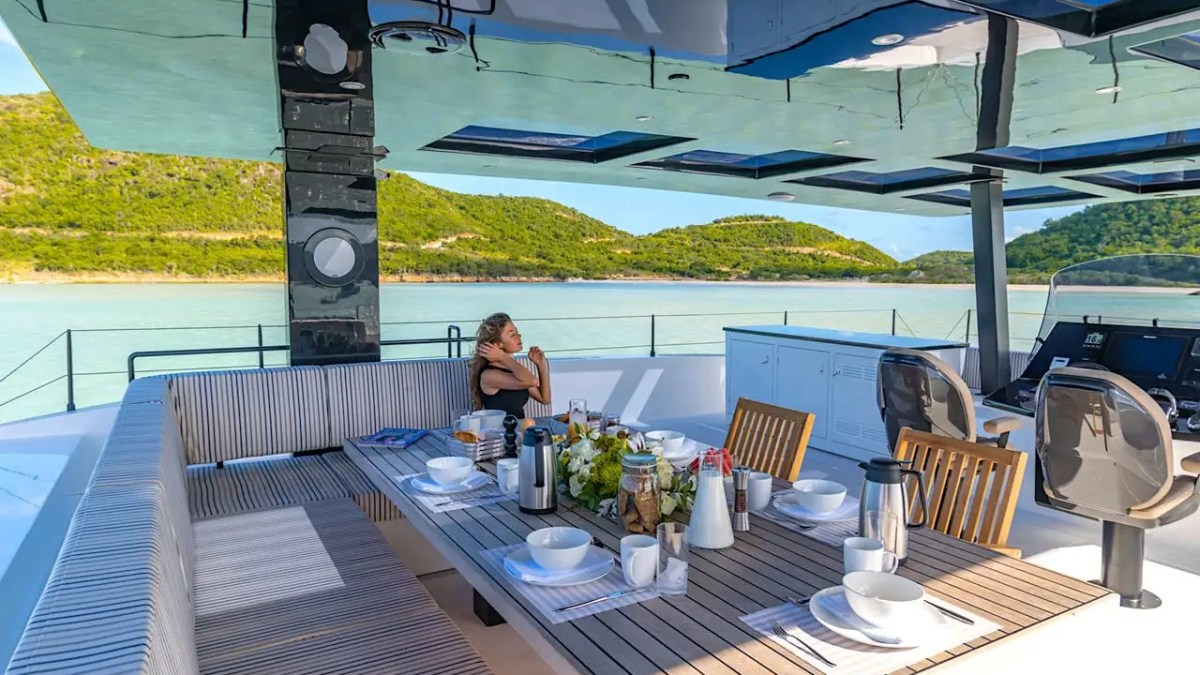70' Sunreef yacht flybridge dining area ocean view