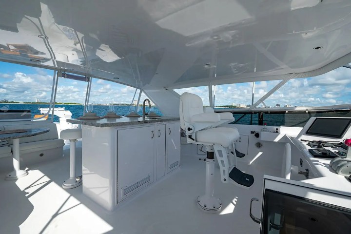 102′ Hatteras foredeck sunbathing Nassau