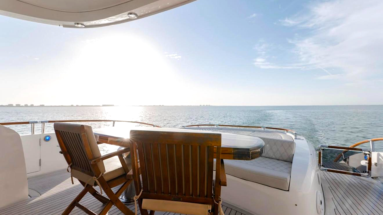 Aft shaded social area on 80′ Lazzara Miami