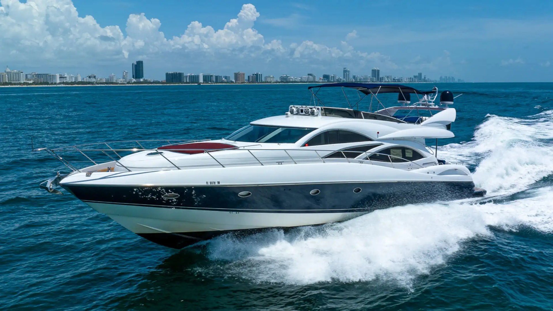 Aerial cruising pass of 80′ Sunseeker Miami