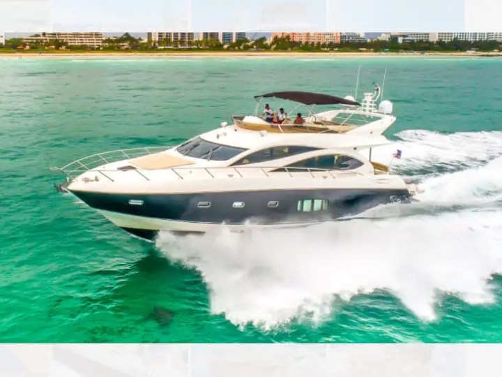 75' Sunseeker yacht charter cruising turquoise waters near Miami Beach coastline