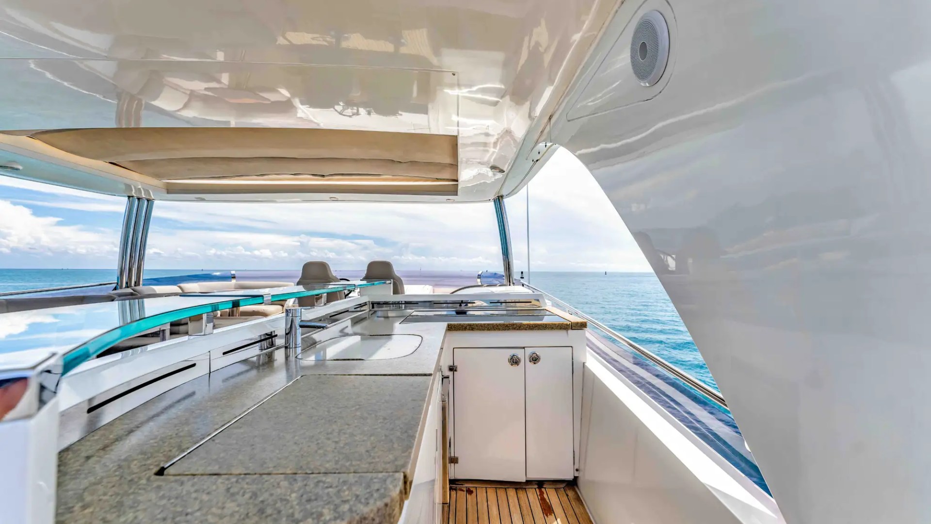 88' Princess yacht charter flybridge bar and dining area Miami Beach Biscayne Bay