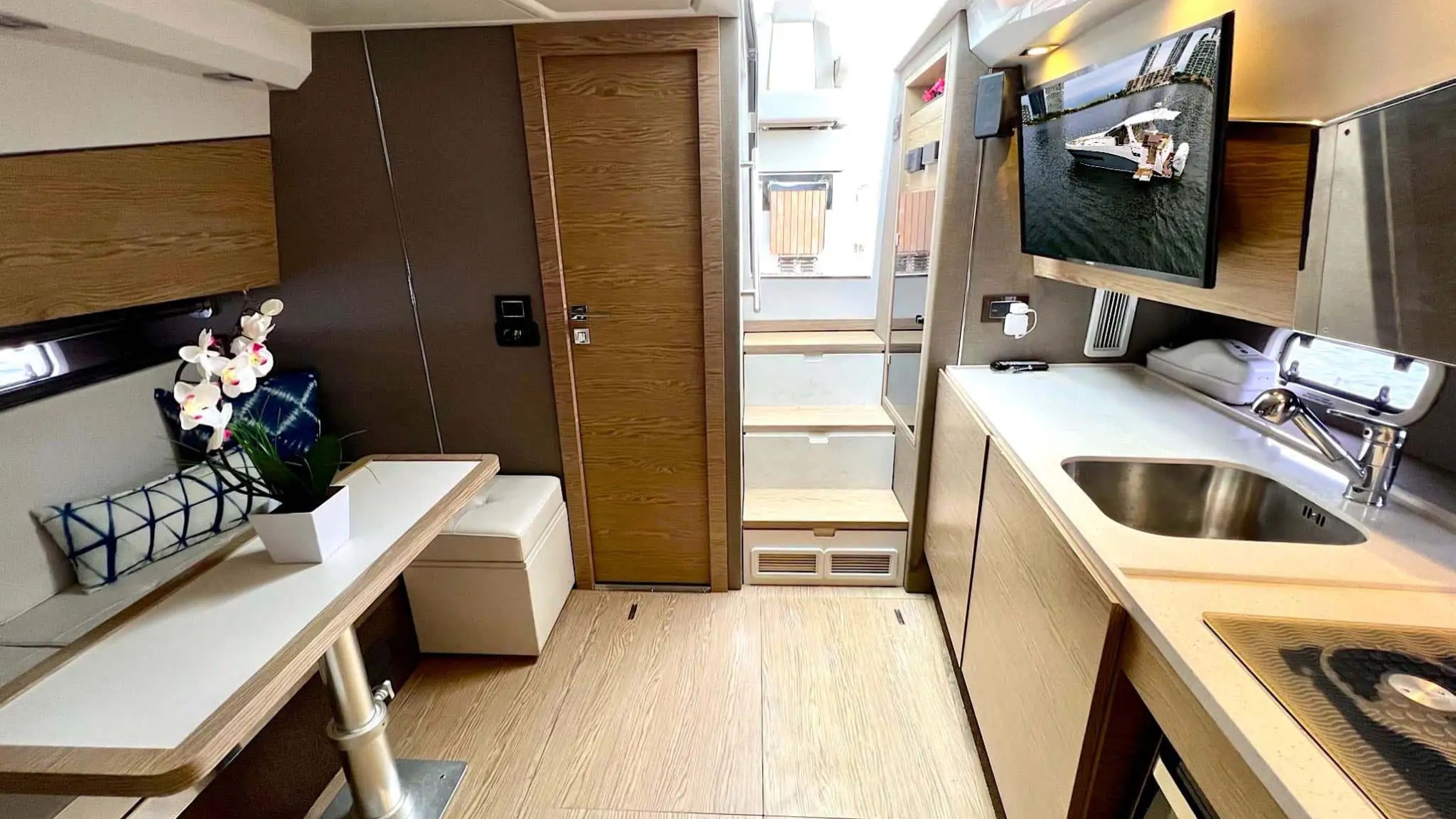 Galley area with countertops and appliances