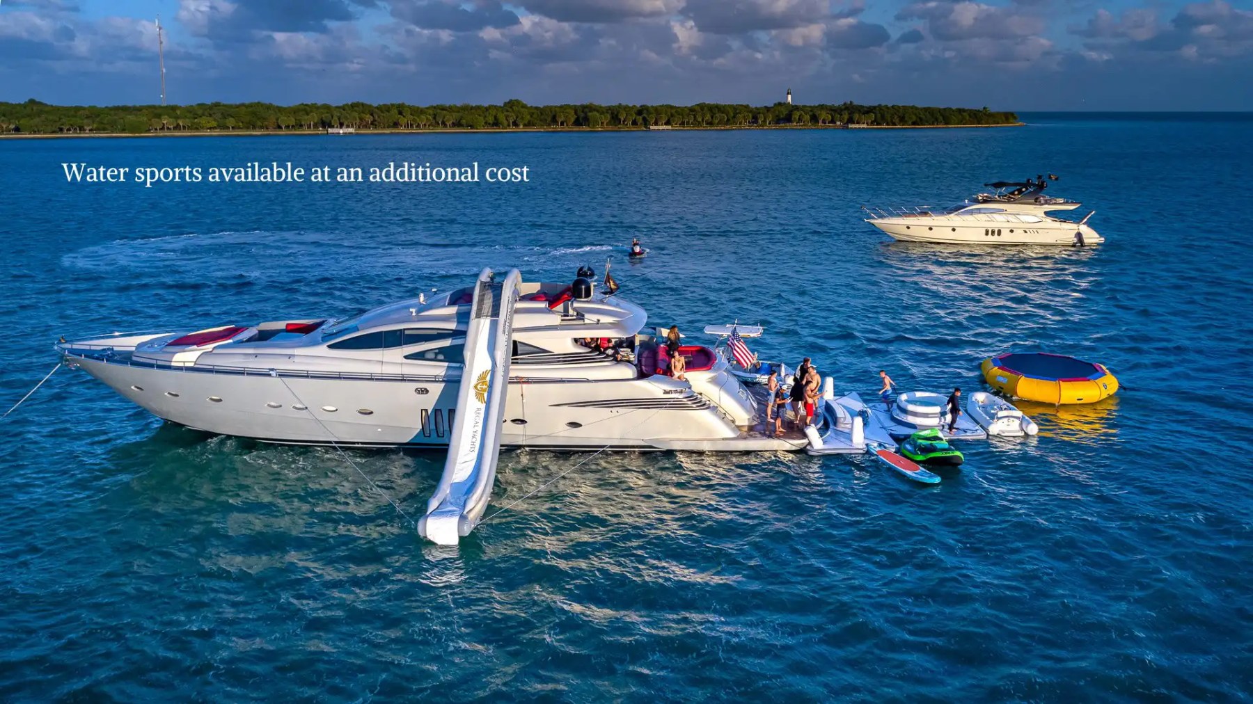 Side view of 90′ Pershing Miami with water toys on platform