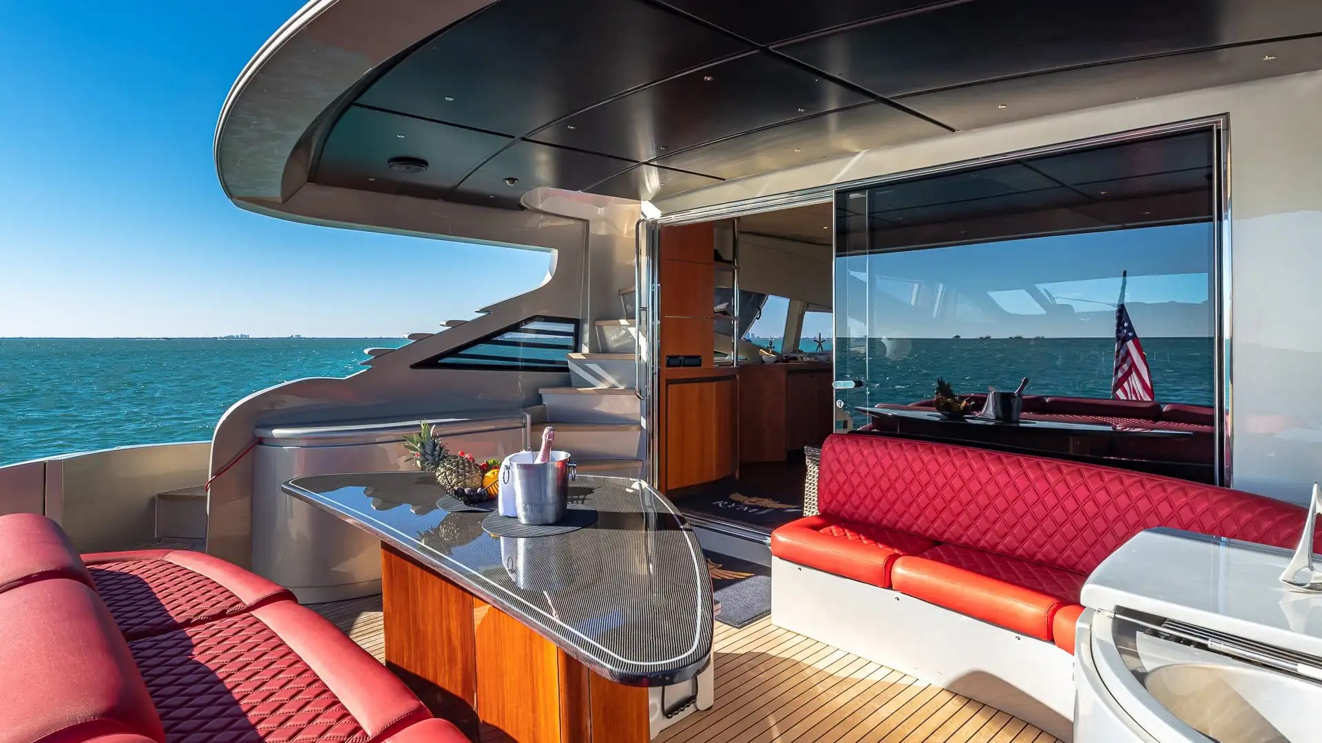 Aft shade lounge on 90′ Pershing Miami