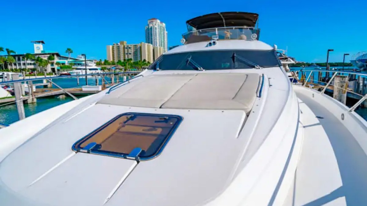 75' Sunseeker yacht charter bow sunpad lounge docked in Miami Beach marina