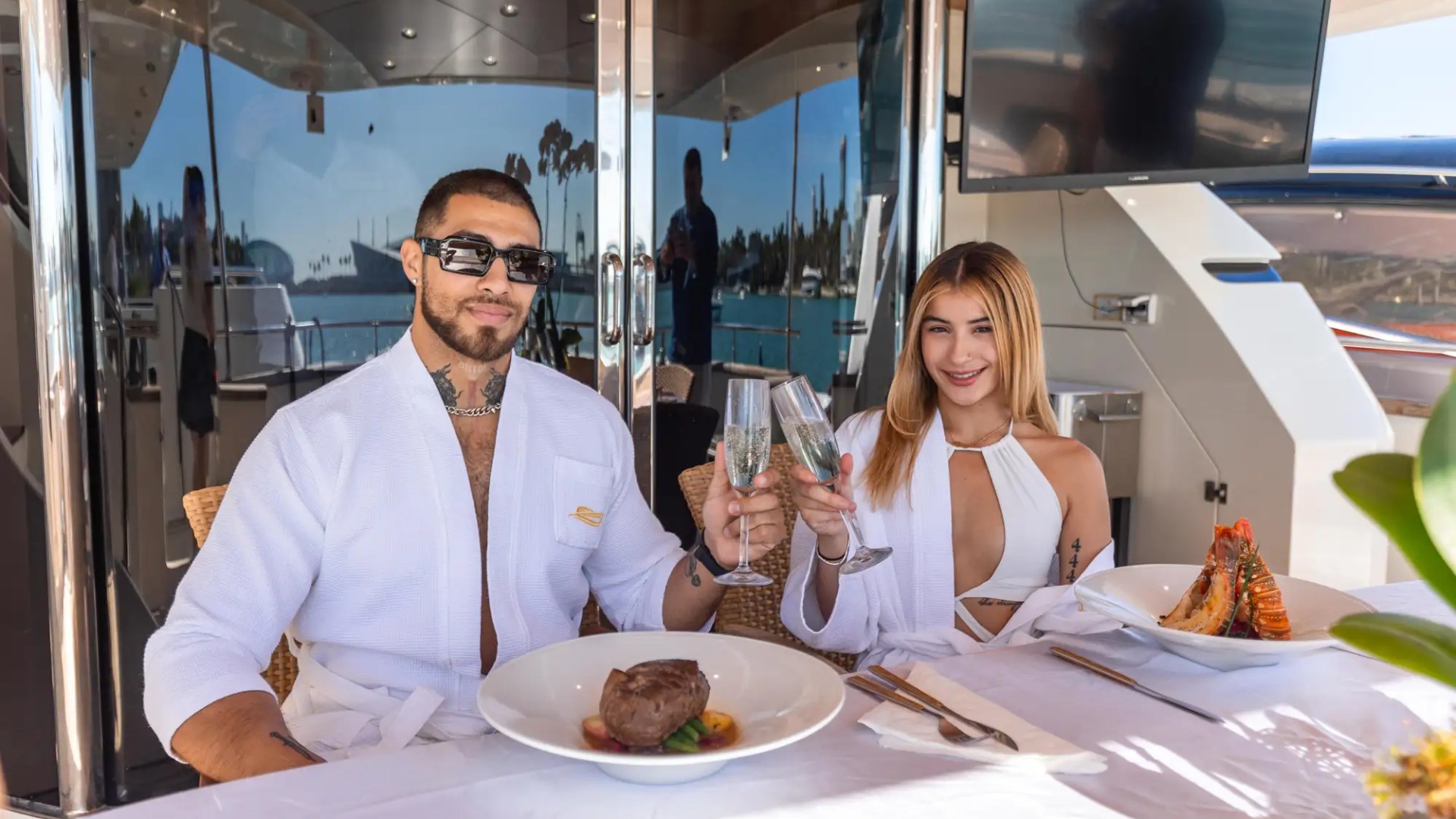 Aft dining setup on 100′ Azimut Miami