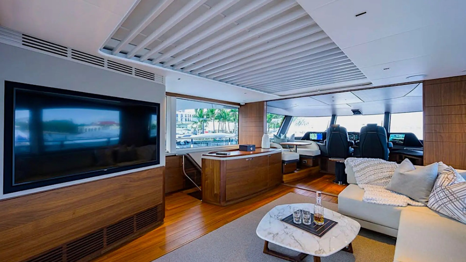 Lounge seating in salon on 100′ Princess Miami