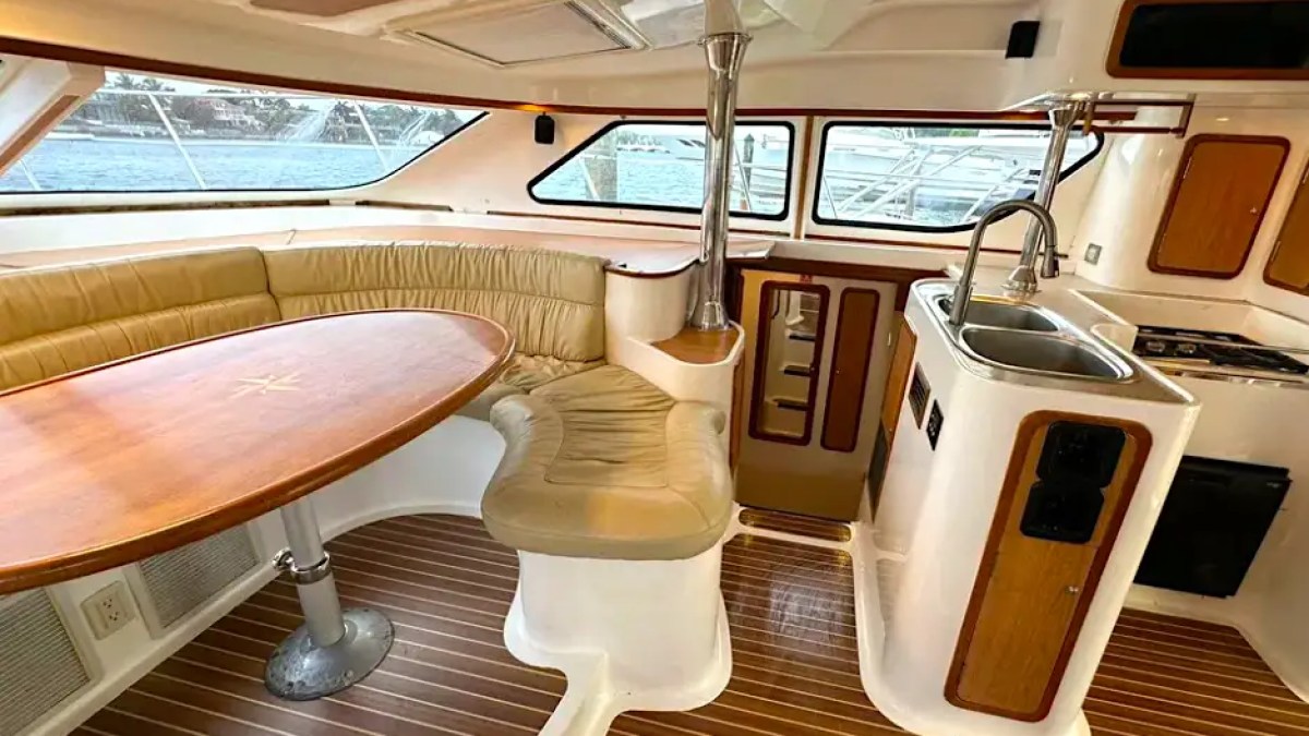 Dining table area on 52′ Africat Miami