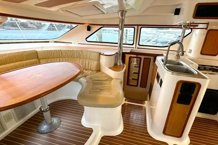 Dining table area on 52′ Africat Miami