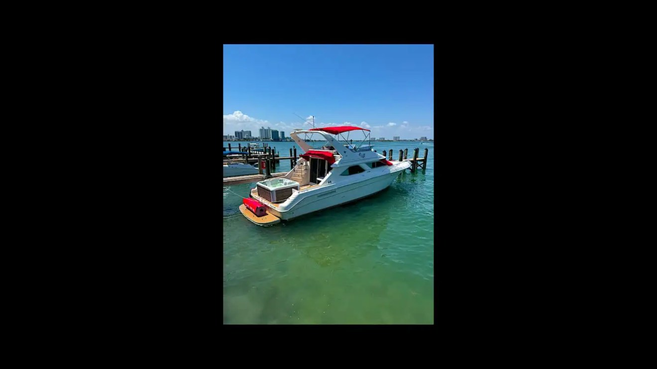 48′ SeaRay boat hull gleaming under sun