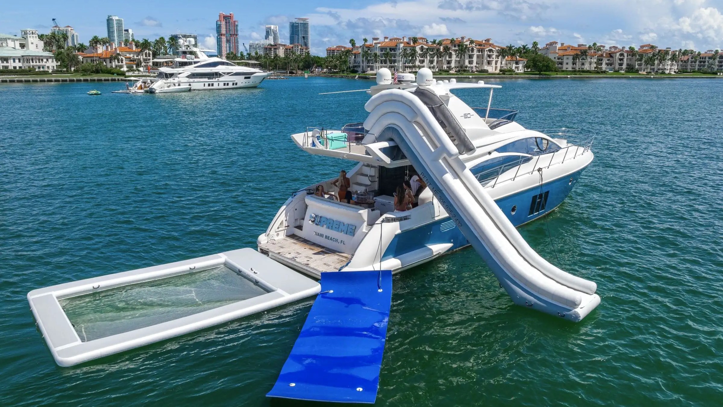 62′ Azimut yacht anchored stern view in Miami Beach