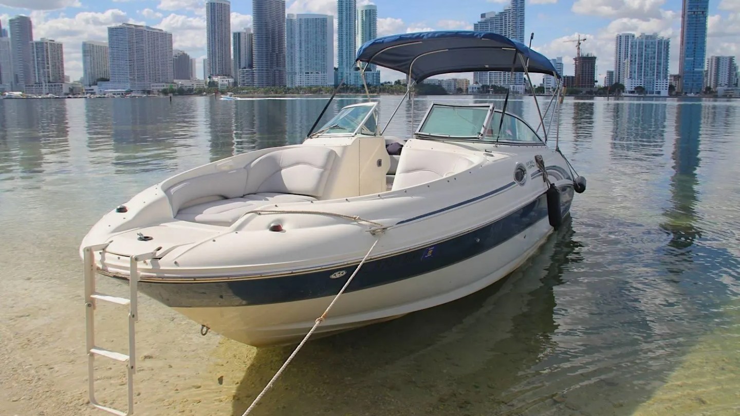 26′ Sea Ray boat anchored near small island in Biscayne Bay