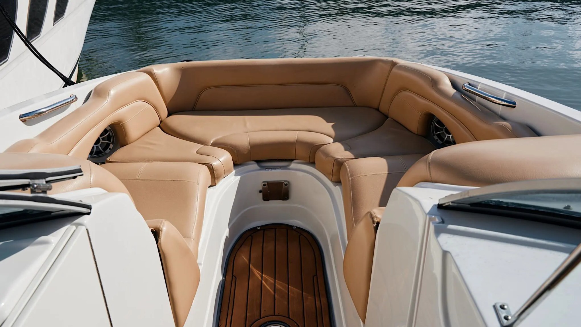 Aft seating with skyline view on 27′ Crownline Miami Beach