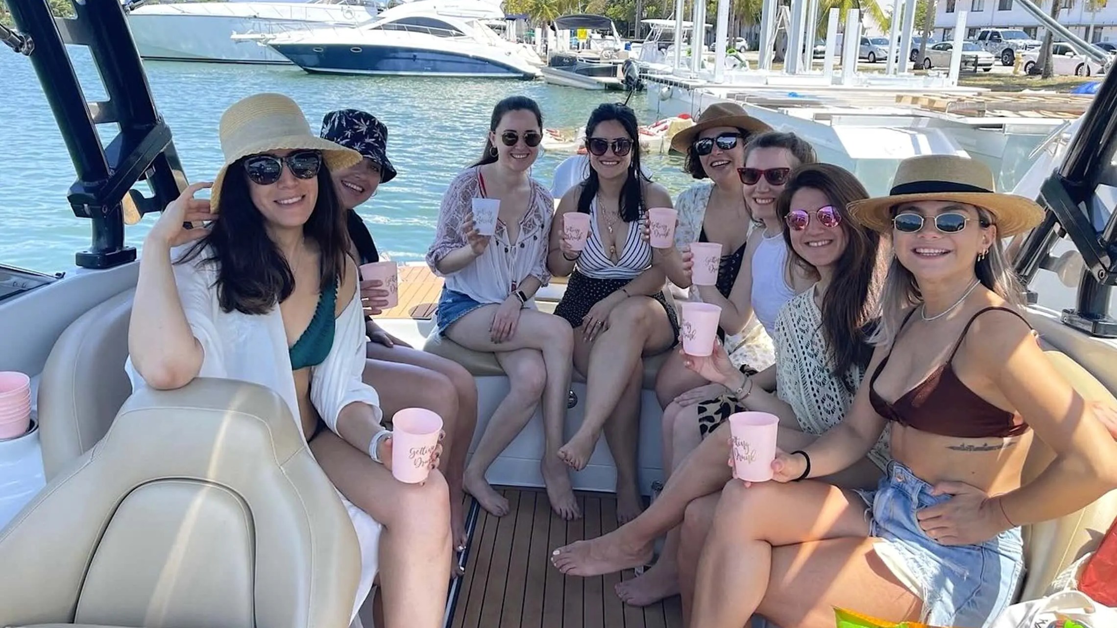 Aft sun-drenched seating on 27′ Crownline Miami Beach