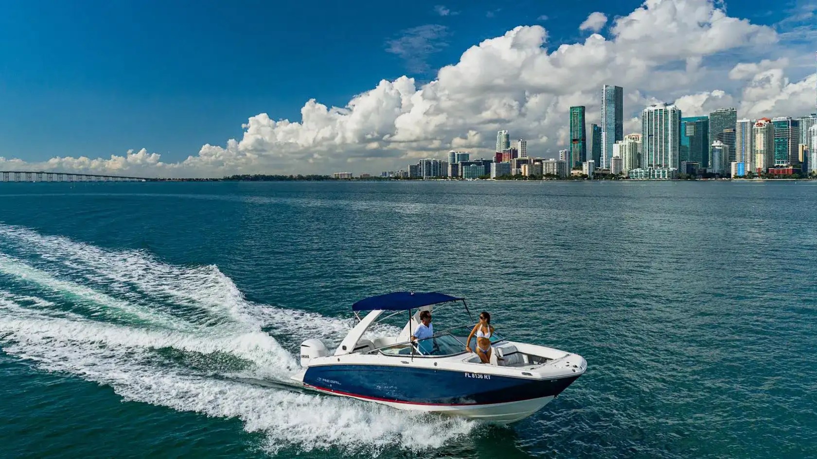 Low forward drone approach on 27′ Regal Miami Beach
