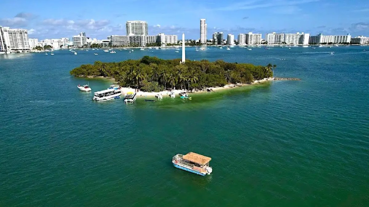 Guest group laughing at anchor on 30′ Tiki – Miami