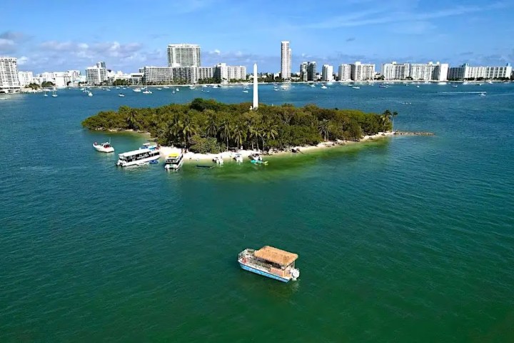 Guest group laughing at anchor on 30′ Tiki – Miami
