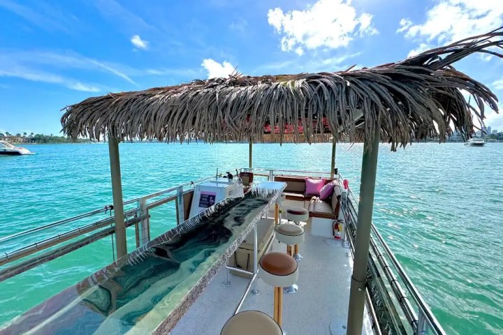 Rotating party seats inside on 30′ Tiki – Miami