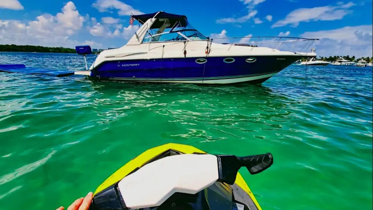 Low forward drone approach on 36′ Monterey Miami Beach