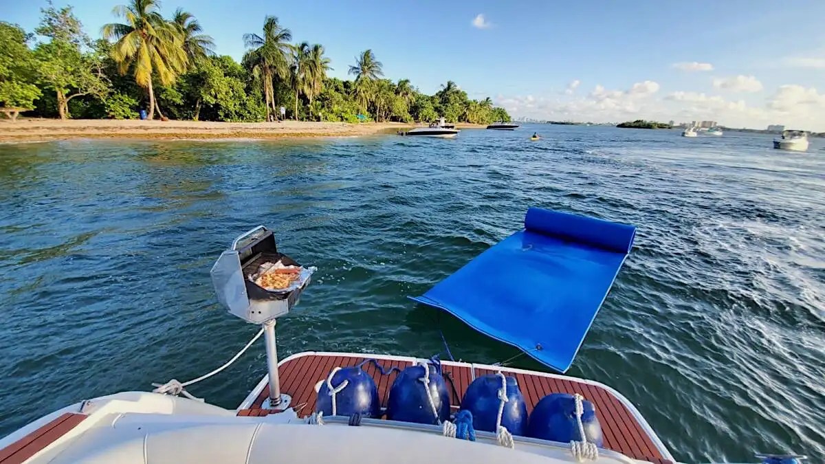 Magic carpet water toy floating near 36′ Monterey Miami Beach