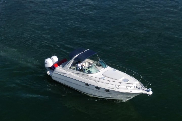 Full profile shot of boat underway on 37′ Monterey Miami