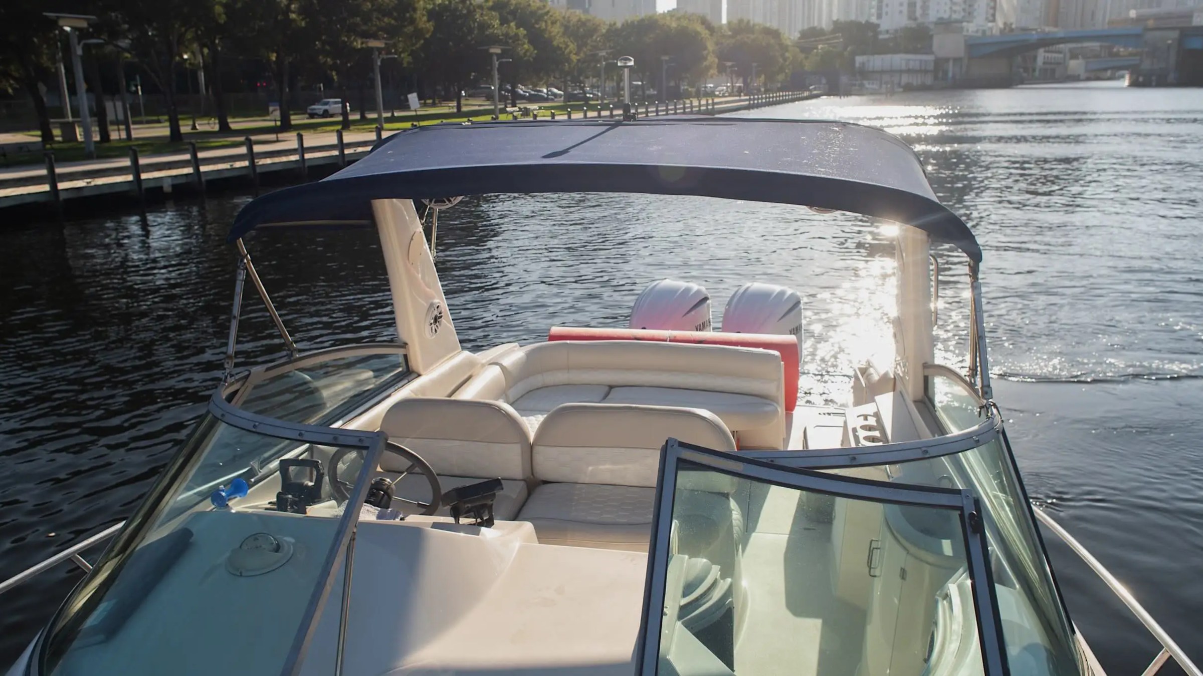 Shoreline approaching as boat cruises on 37′ Monterey Miami