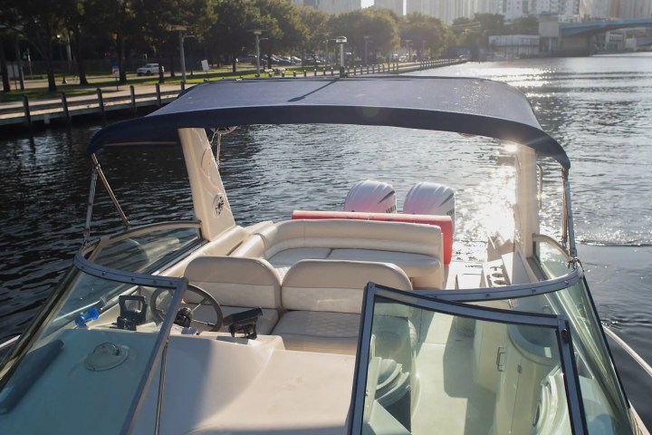 Shoreline approaching as boat cruises on 37′ Monterey Miami