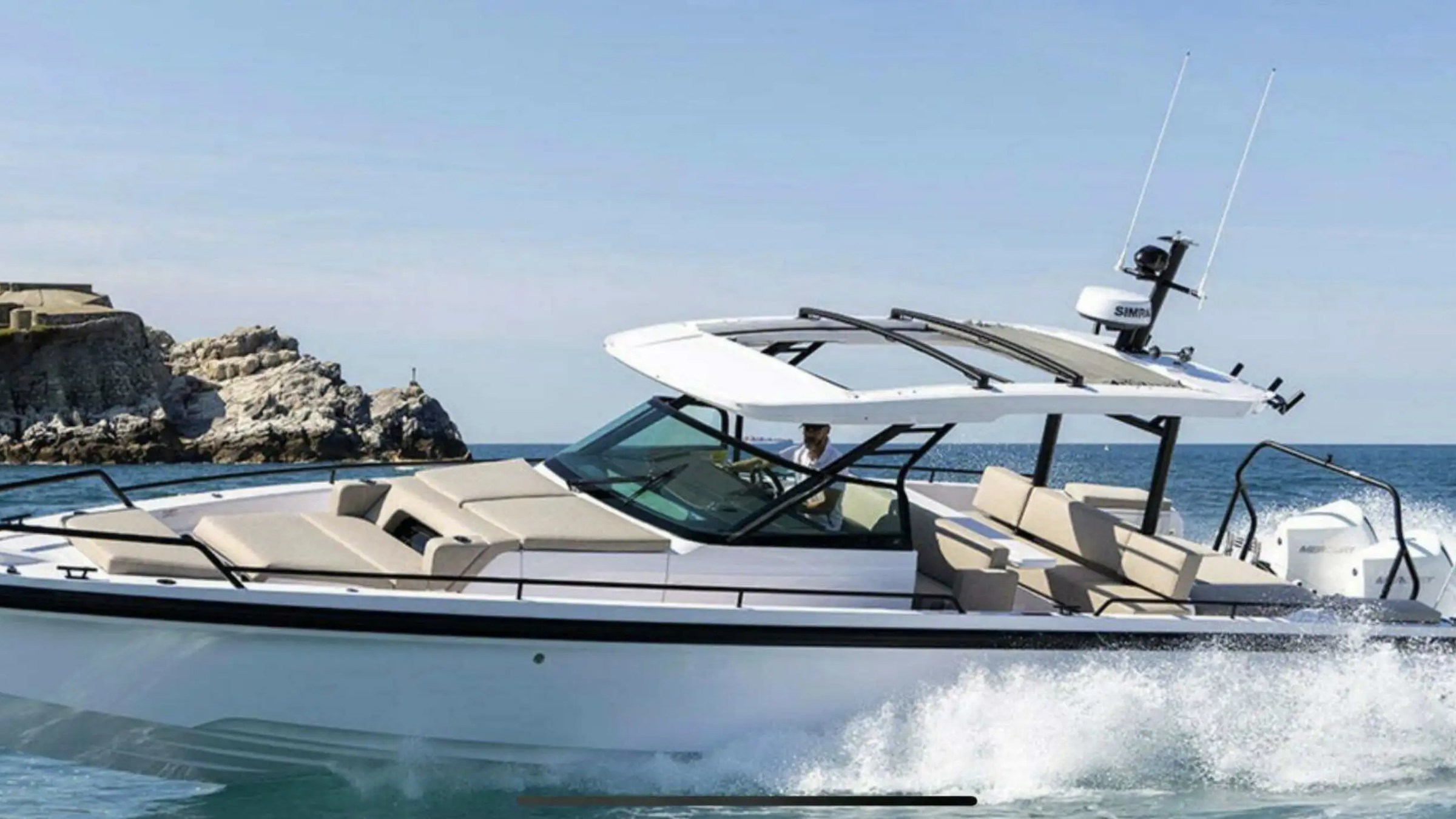 Drone side pass of 38′ Axopar Miami