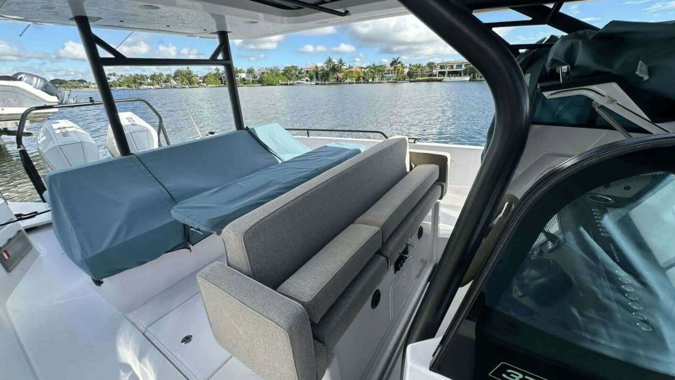 Aft cockpit social seating on 38′ Axopar Miami