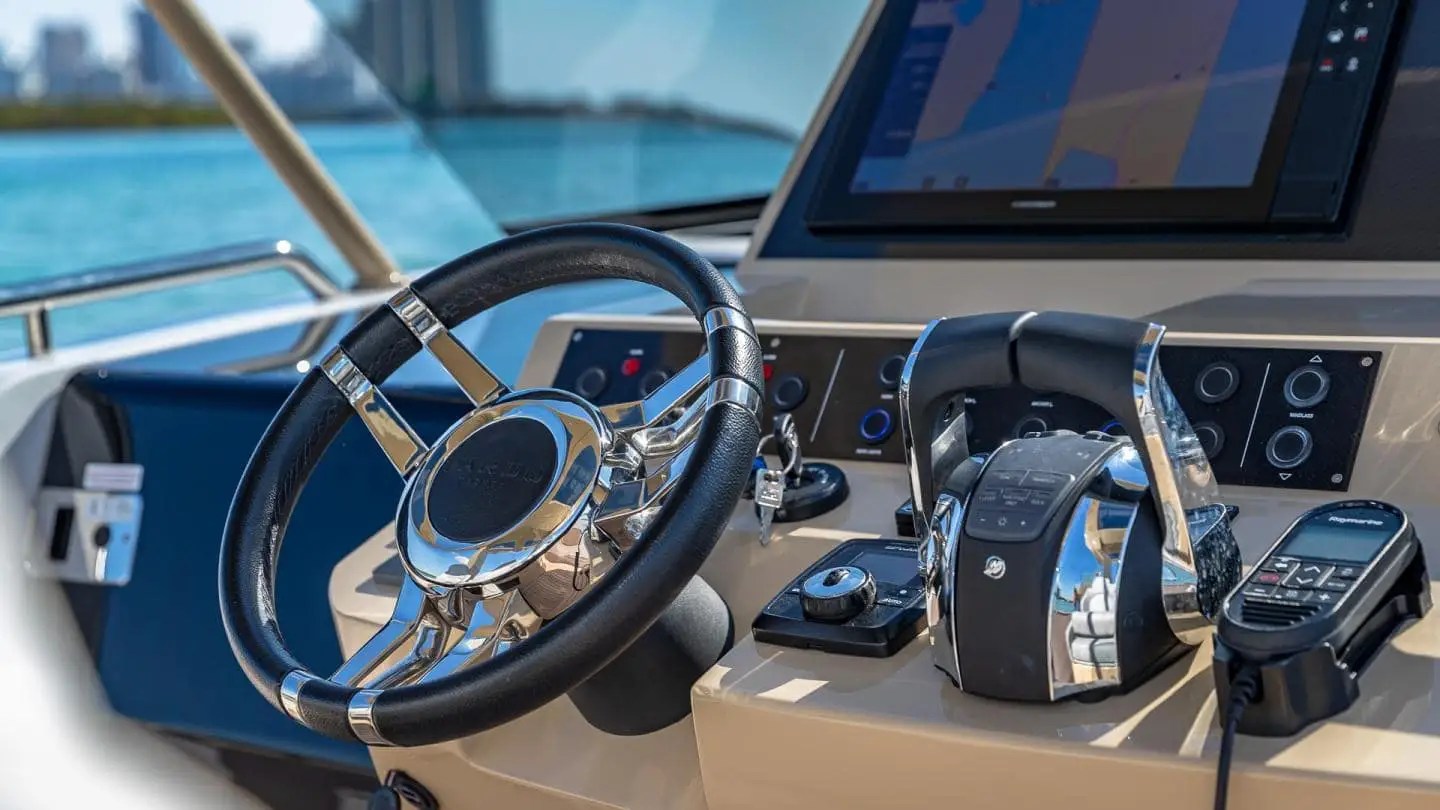 Close-up of steering wheel and controls on 38′ Pardo Miami Beach