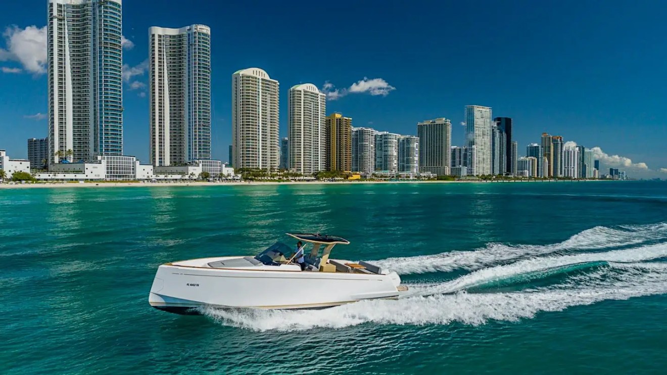 Side aerial drone pass of 38′ Pardo Miami Beach