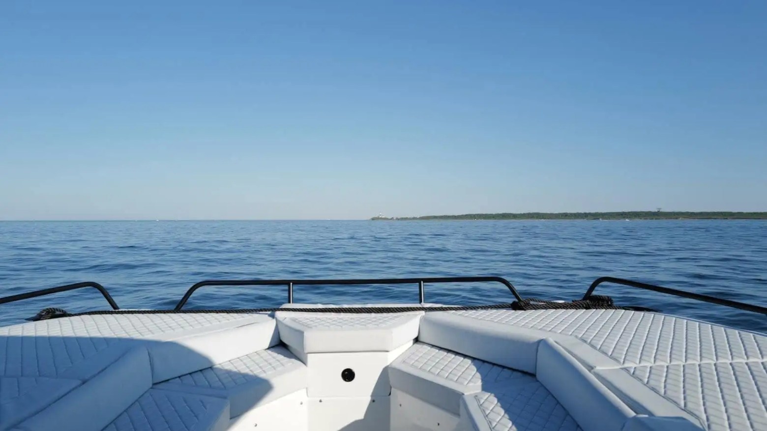 Boat cruising across Biscayne Bay on 38′ Tesoro Miami