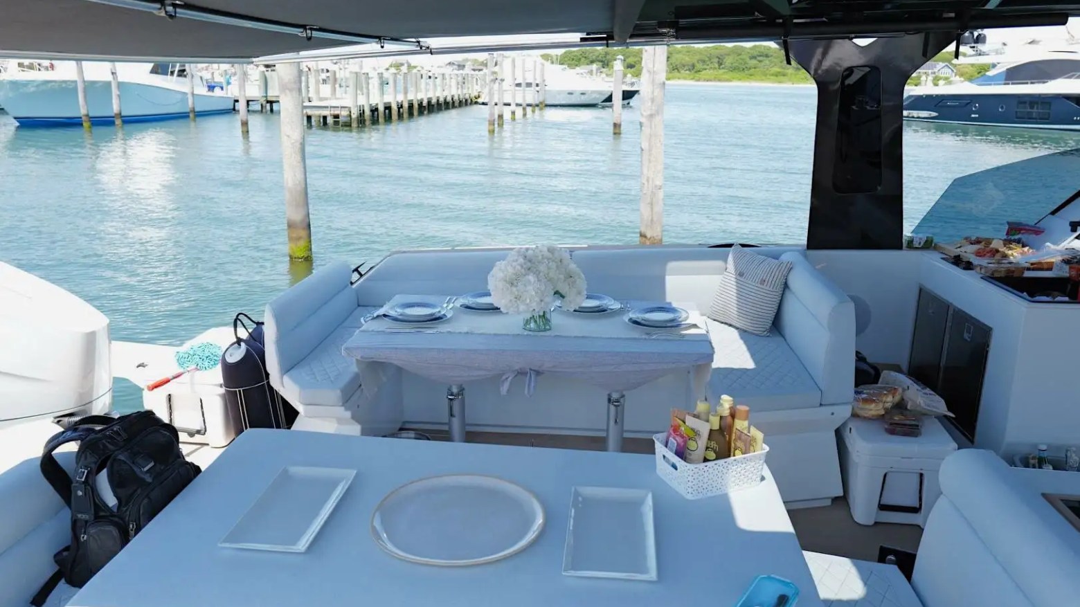 Cockpit table setup for dinner on 38′ Tesoro Miami