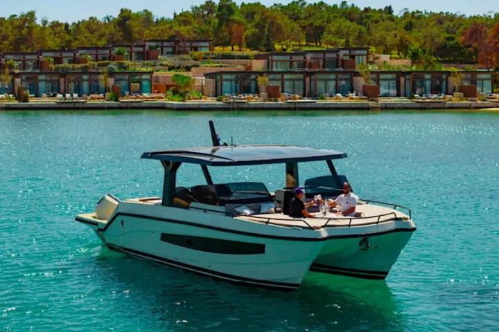 Bow facing Miami coastline on 38′ Tesoro Miami