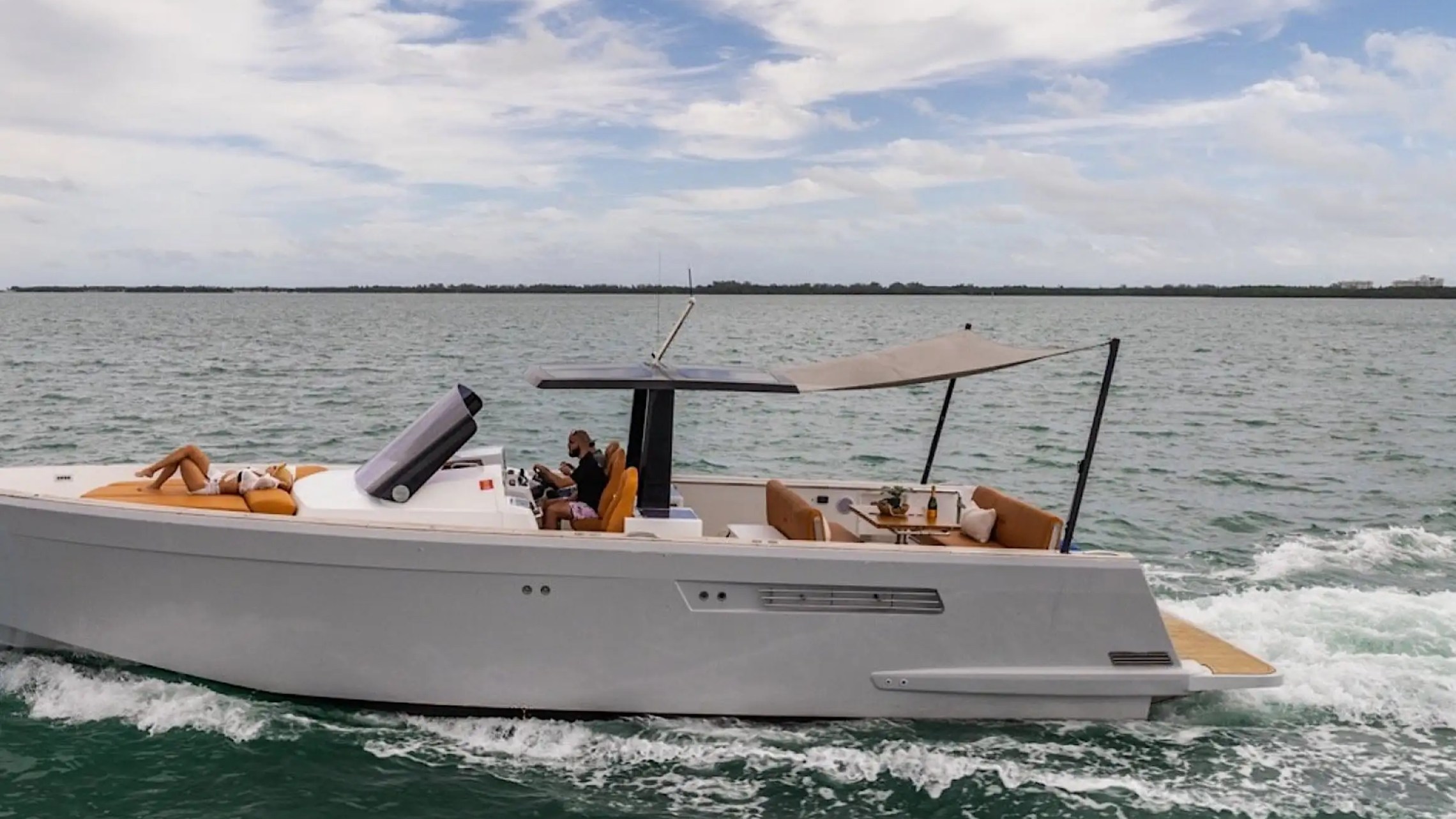 Side aerial drone pass of 40′ Fjord Miami Beach