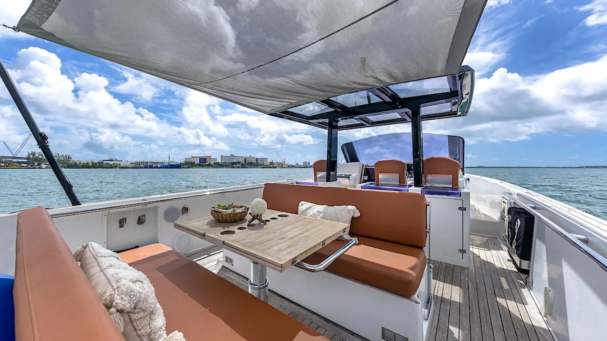 Aft lounge seating on 40′ Fjord Miami Beach