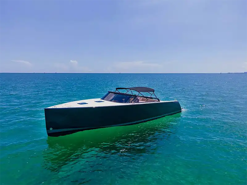 Side aerial drone pass of 40′ VanDutch Miami Beach