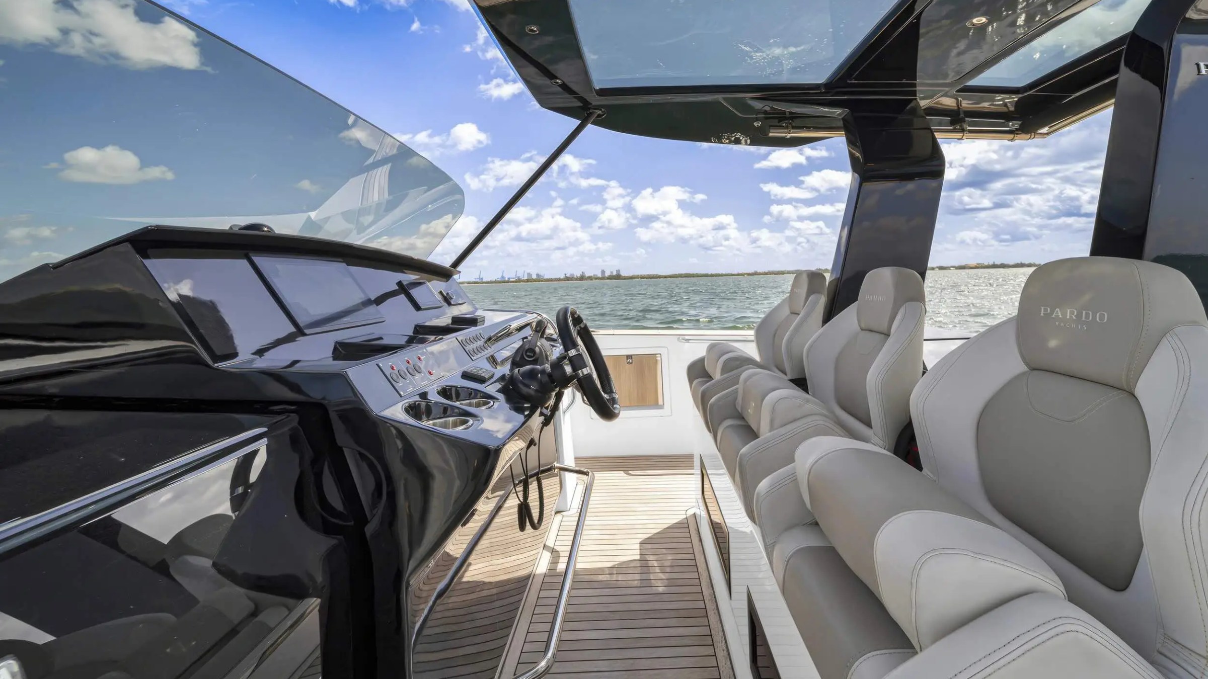 Helm station in cockpit with skyline view