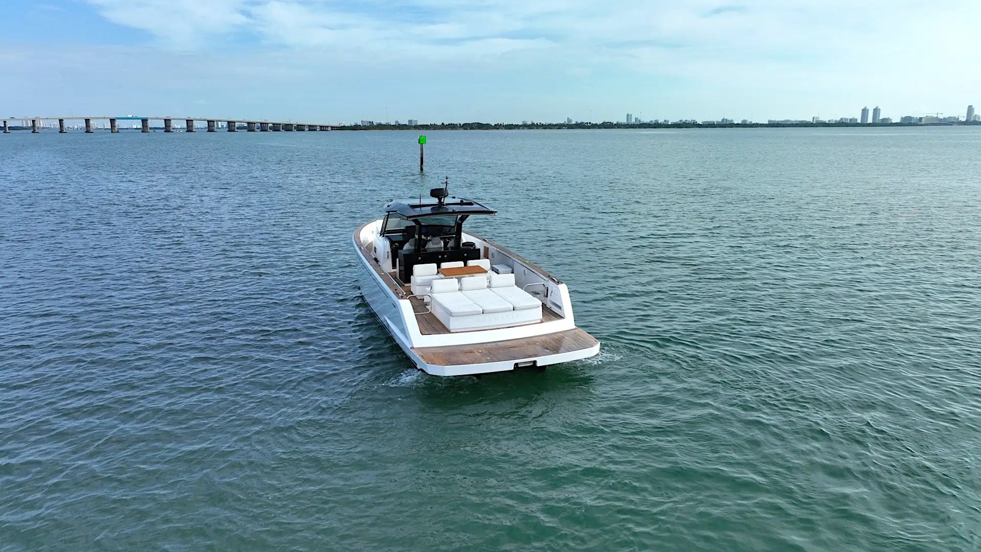Wake trail across Biscayne Bay at sunrise