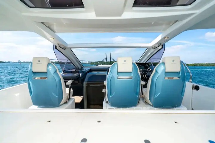 Bow social scene with skyline on 43′ Jeanneau Miami