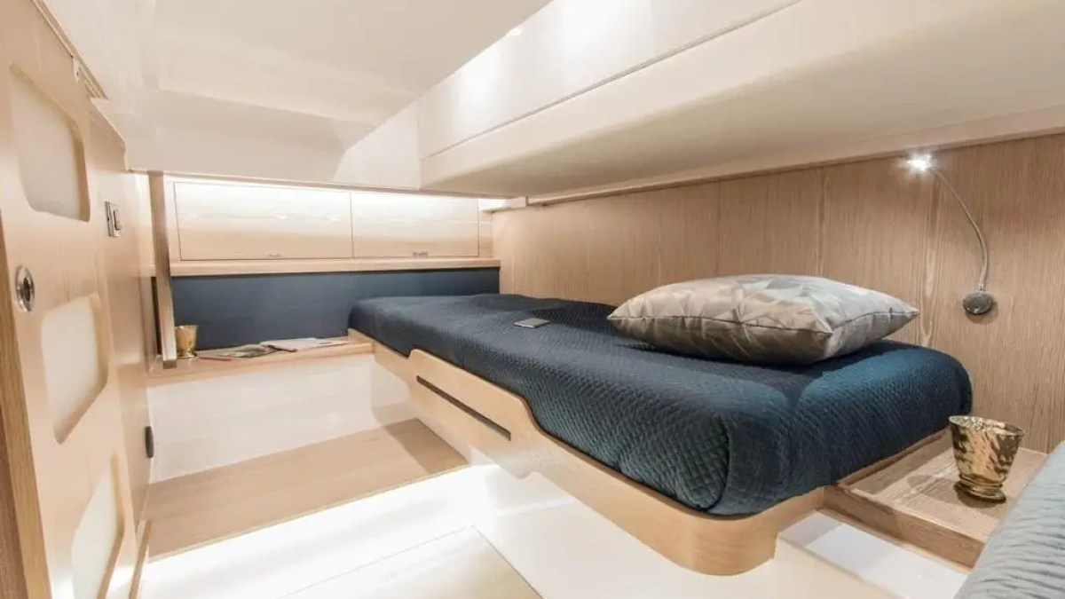 44′ Fjord boat interior berth with pillows