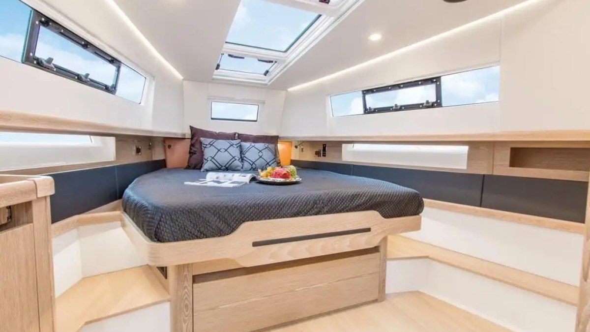 44′ Fjord boat cabin interior with bed and skylight