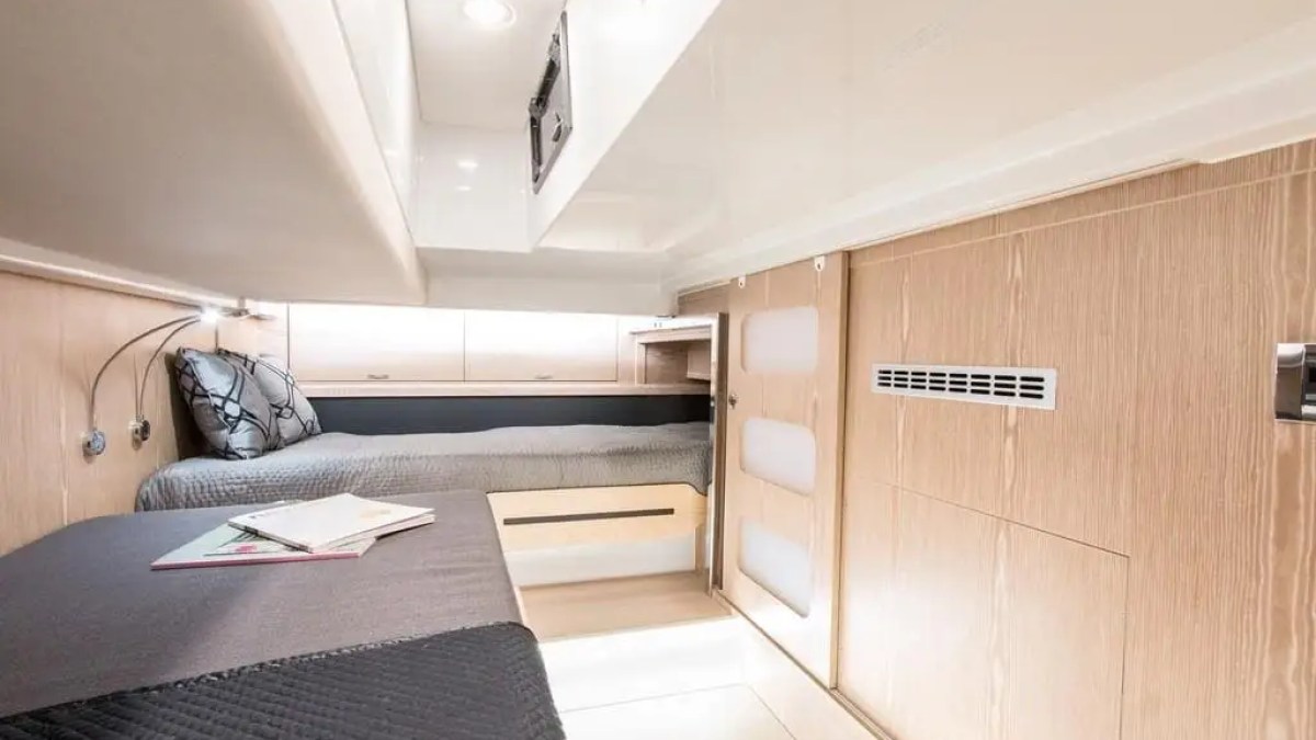 44′ Fjord boat interior berth with pillows