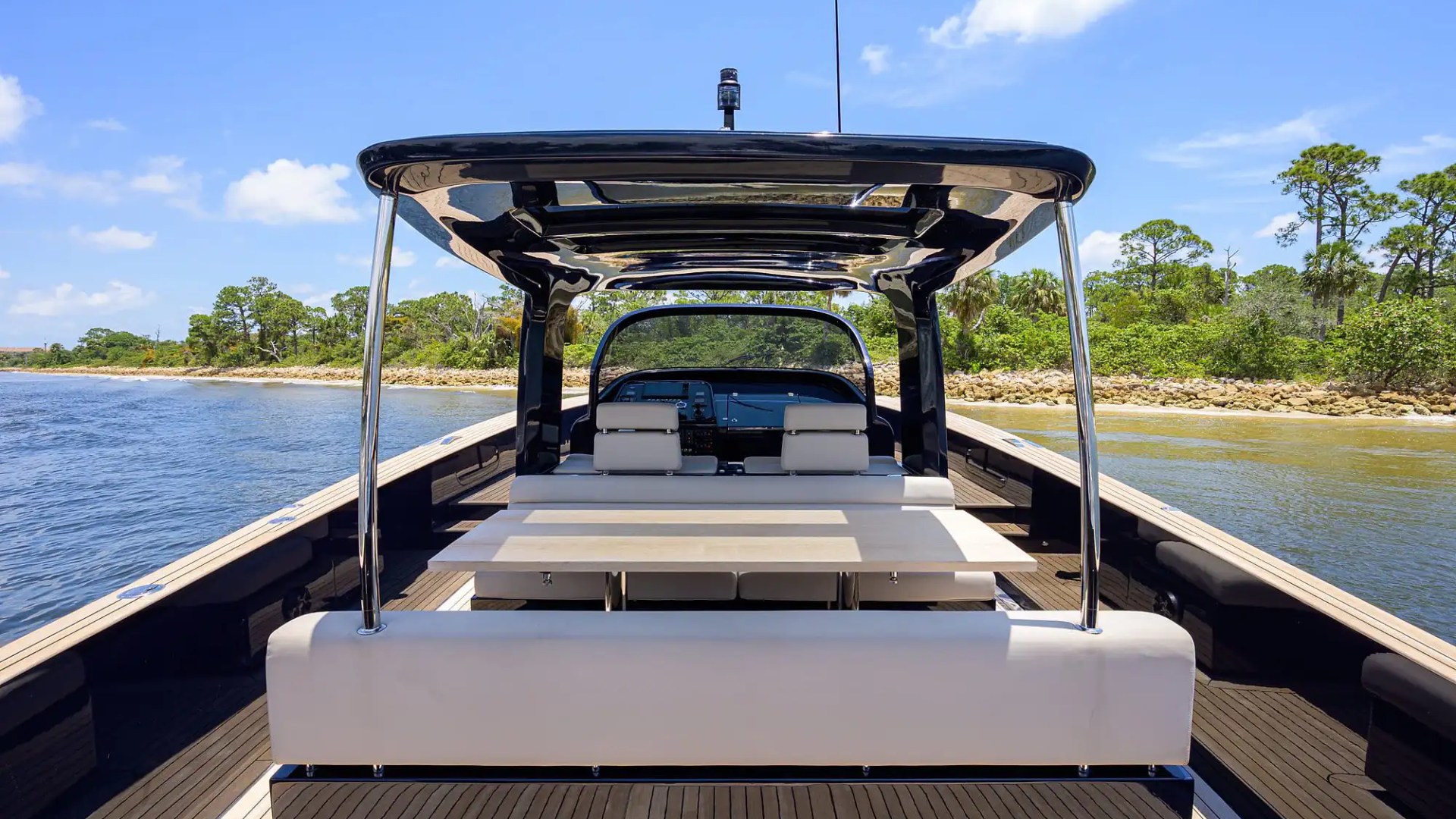 Aft sunpad area on 45′ Alen boat with cushions