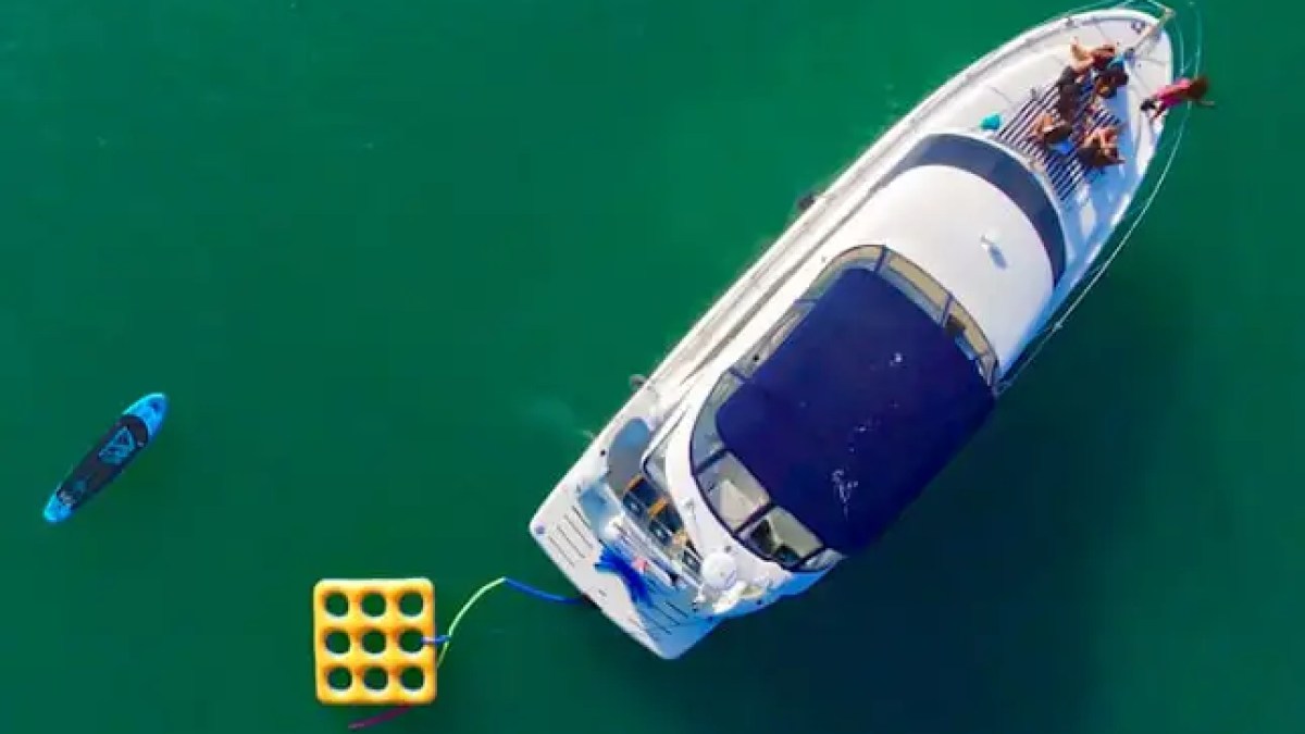 Bow social scene with skyline on 45′ Meridian Miami