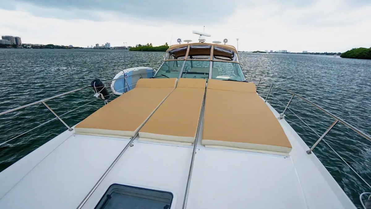 45' SeaRay boat bow sunpad anchored Miami Beach