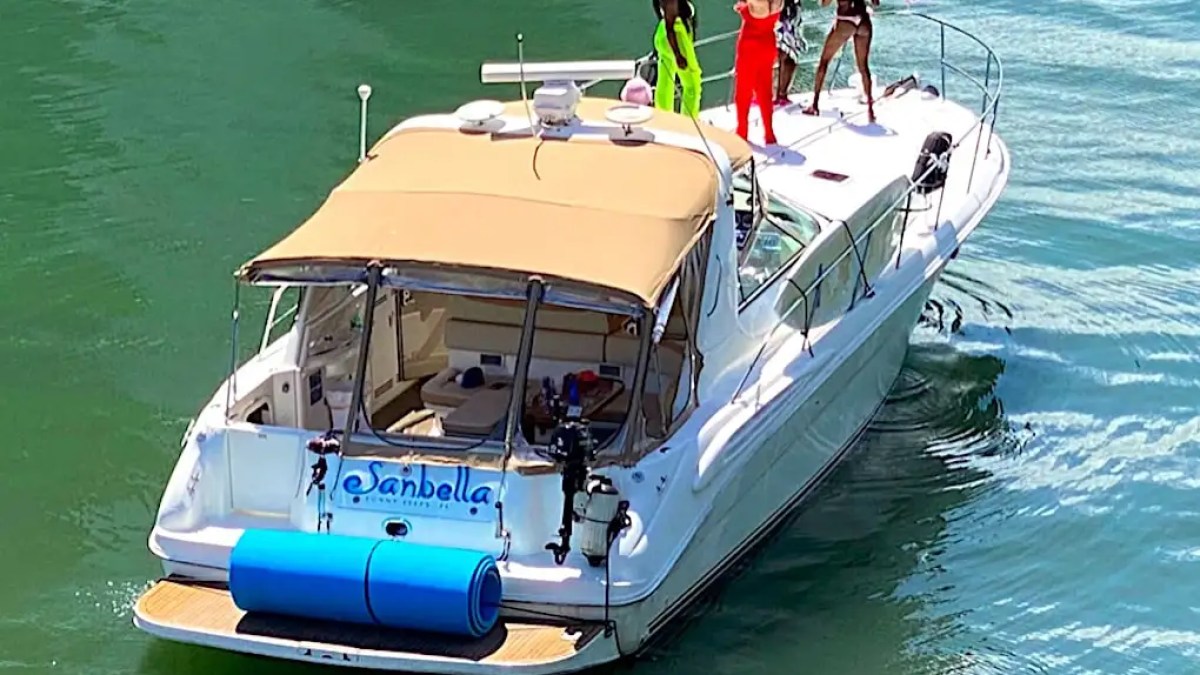 45′ SeaRay boat drone shot anchored off shore