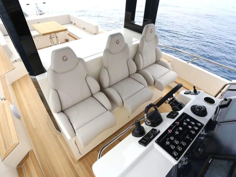 51' Capelli yacht helm station with controls and windscreen in Miami Beach
